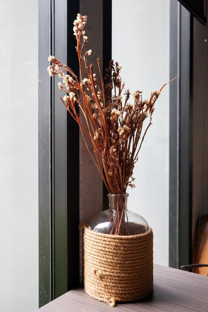 Photo close-up of vase on table at home