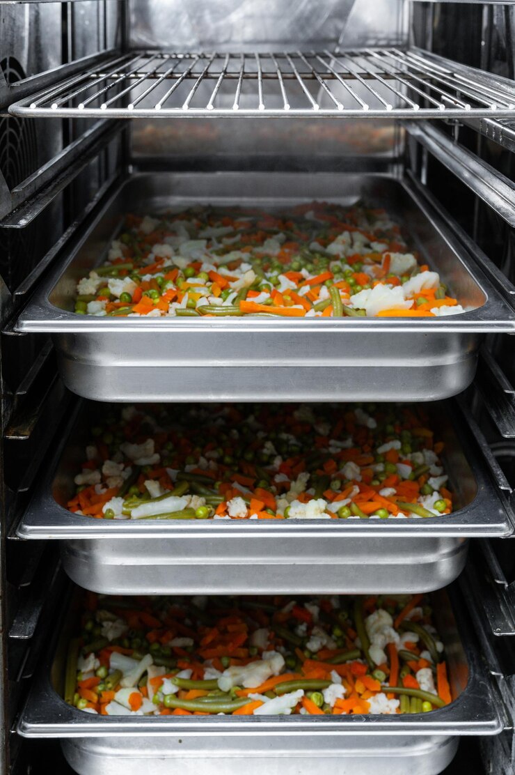 Close up of vegetable stew at the oven of a commercial kitchen