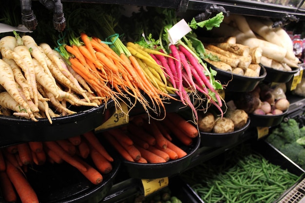 Photo close-up of vegetables for sale at market stall