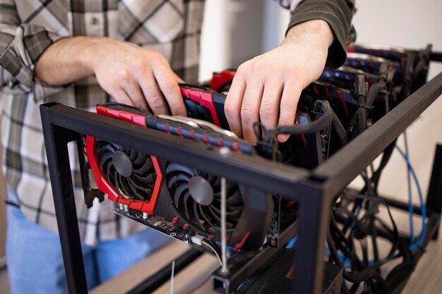 Close up view of assembling new bitcoin mining rig and graphics cards