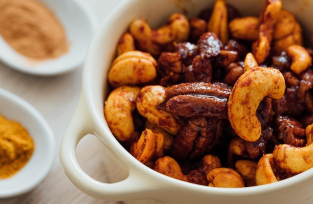 Close up view of a bowl with spicy nuts