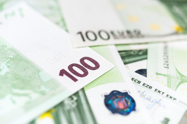 Close-up view of cash money euro bills background. Finance and business concept. Close-up. Shallow depth of field.