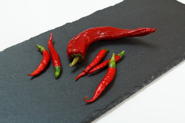 Close up view of chillis on the board