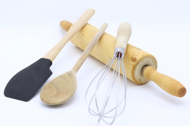 Photo close-up view of cooking tools against white background