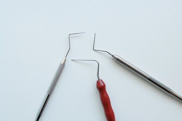 Close up view of dental probes instruments on white background