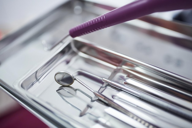 Close up view of different dental tools in clinic