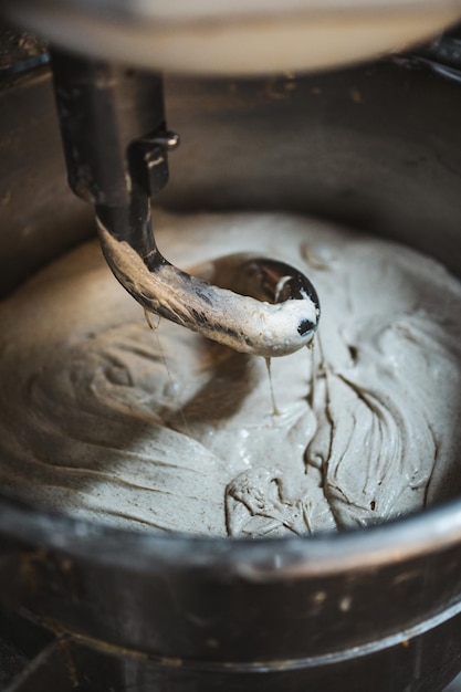 Close up view of electric dough mixer machine in bakery It is kneading bread dough