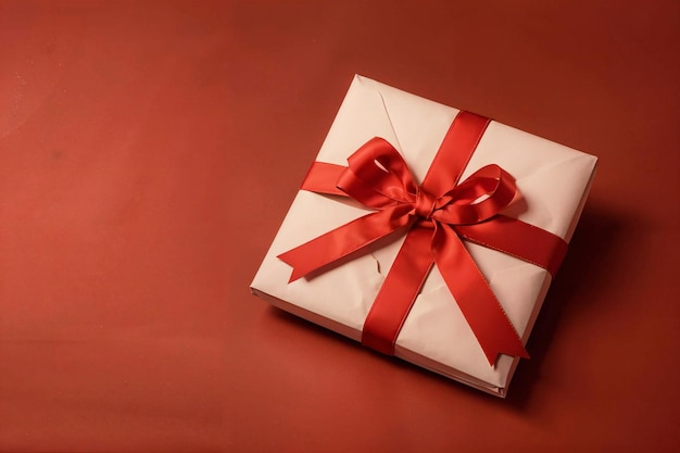 Close up view of empty envelope and present with ribbon isolated on red background