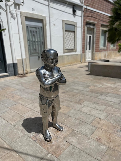 Close up view of the famous tale of the boy with big eyes in Olhao