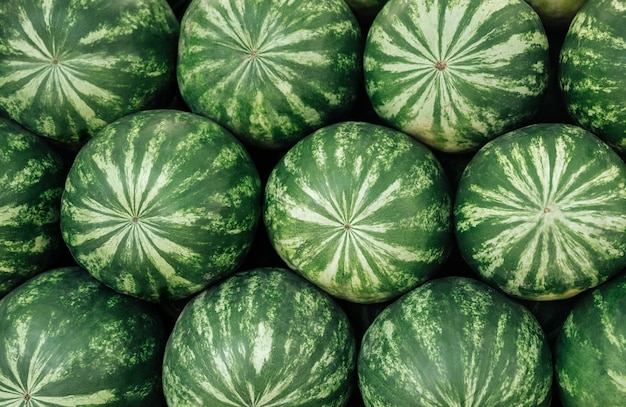 Close-up view of a heap of fresh watermelons