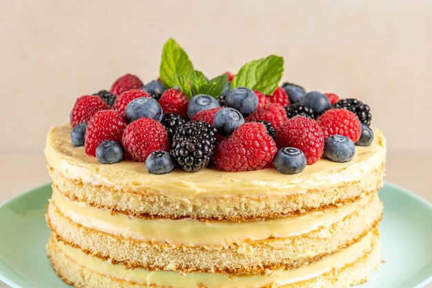 Close-up view of homemade cake with fresh berries.