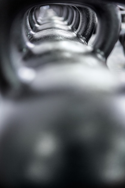 Close up view of kettlebells in a row