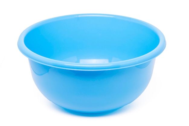 Close up view of a kitchen blue plastic container isolated on a white background.