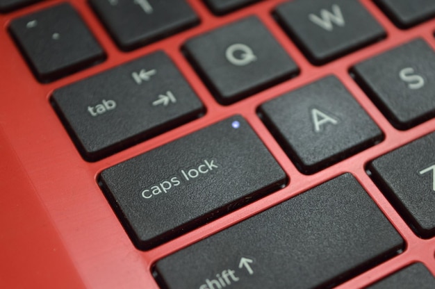 Photo close up view of laptop keyboard modern technology