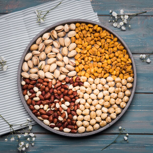 Close-up view of mixed nuts on wooden table