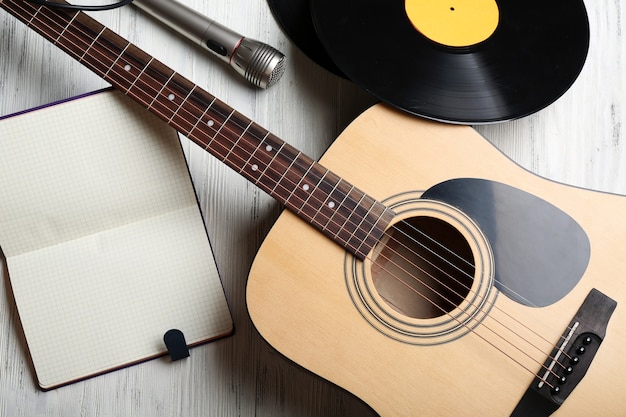 Close up view on musical equipment against grey wooden surface