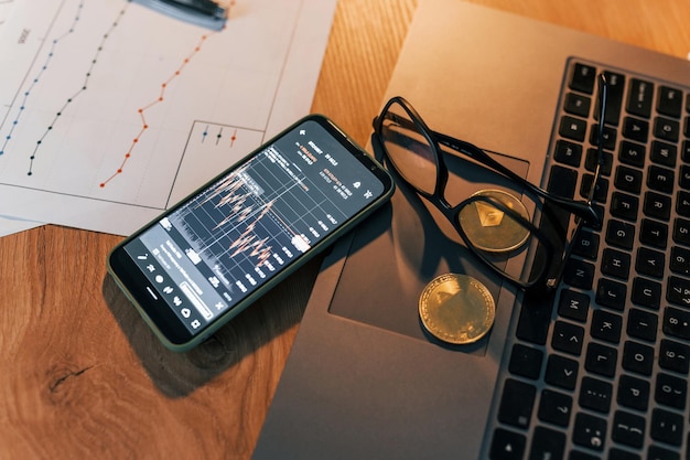 Close up view of phone and laptop Conception of exchange