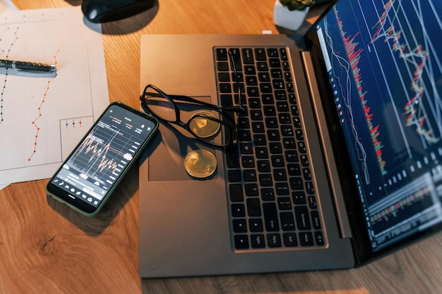 Photo close up view of phone and laptop conception of exchange