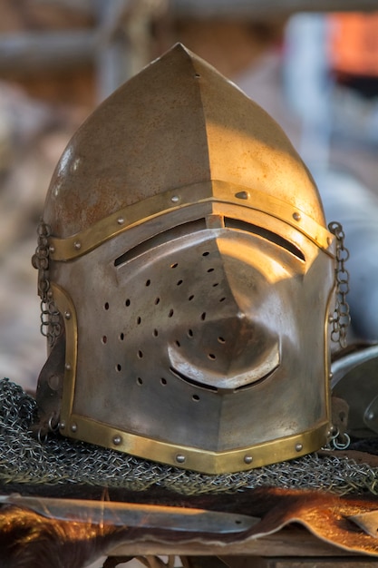 Photo close up view of a pigface bascinet helmet.