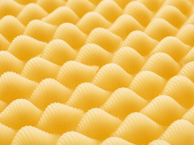 Close up view to raw shell pasta patterns horizontal frame