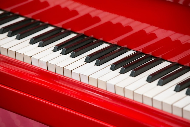 Close up view of red piano keys