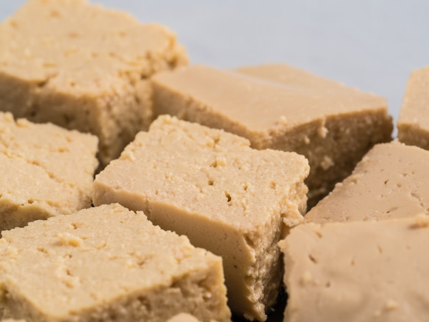 Close up view of soy cheese tofu diced copy space