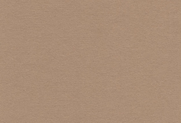 テクスチャードブラウン色のカートン紙の背景のクローズアップビュー特大の非常に詳細な画像