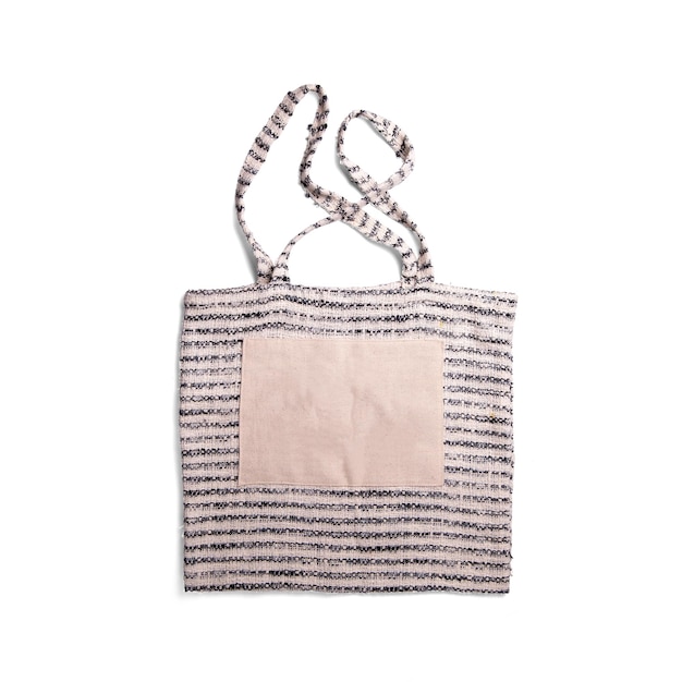 Фото Близкий взгляд на модную сумочку для вашего проекта мокета, изолированную на белом