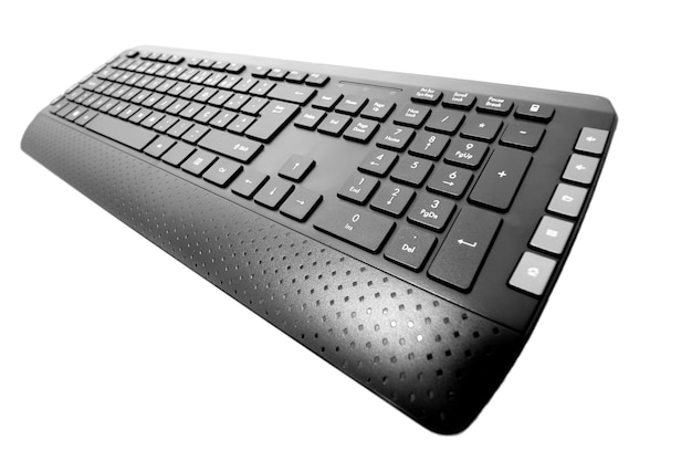 Close up view of a wireless black personal computer keyboard.