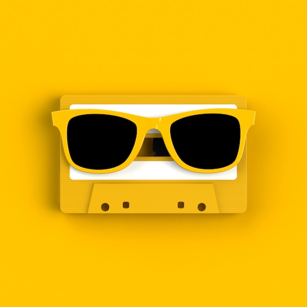 Photo close up of vintage audio tape cassette with glasses