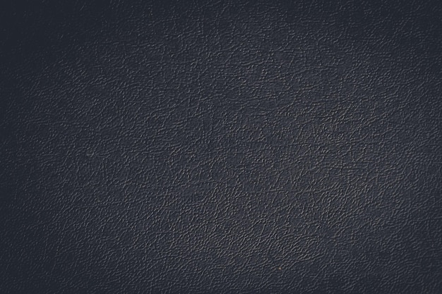 Photo close up vintage of black leather notebook texture background use for your texts display