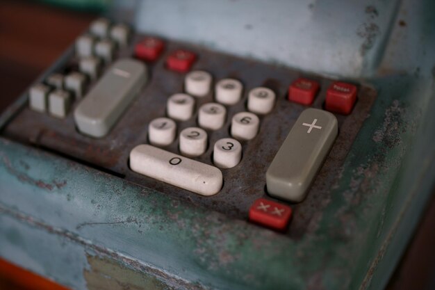 Close-up of vintage calculator keypad