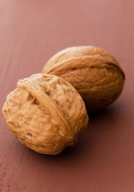 Close up of walnuts over brown table