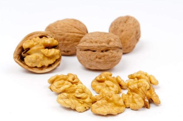 close-up of walnuts over white background