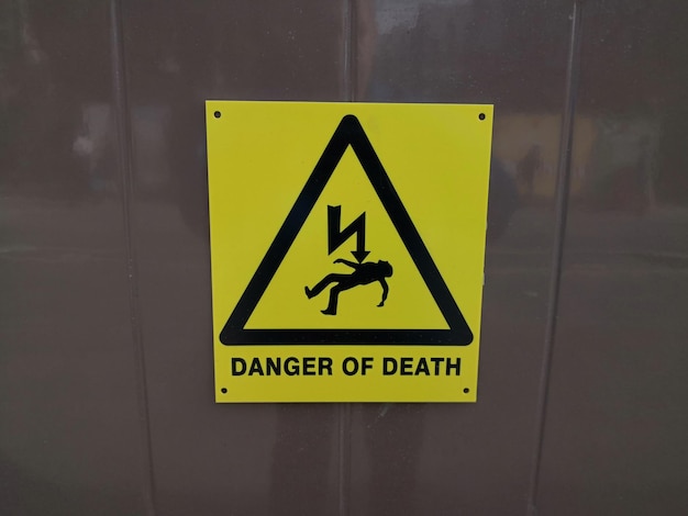 close-up of warning sign on wall