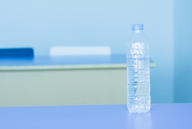 Close-up of water bottle on table
