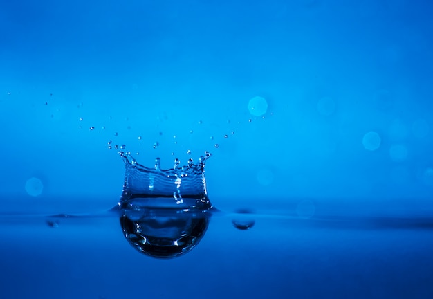 Close up of water drop with bokeh