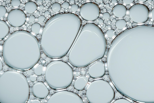 A close up of a water droplet with circles like circles.