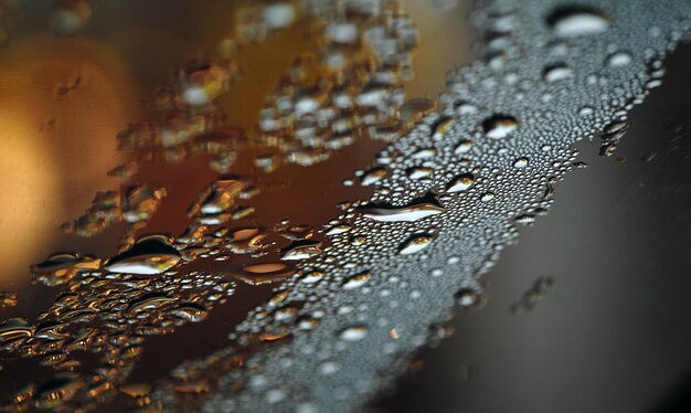 A close up of water droplets on a surface