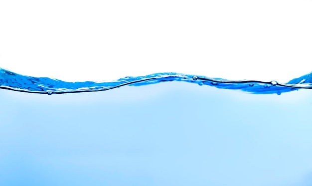 Photo close-up of water drops on glass against white background