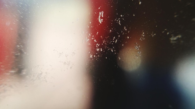 Photo close-up of water drops on glass