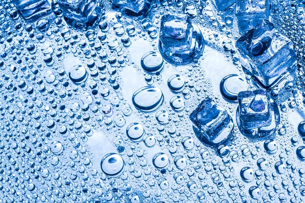 Photo close up of water drops on silver background