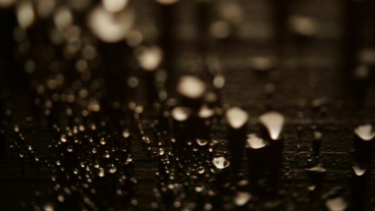 Photo close-up of water drops on spider web