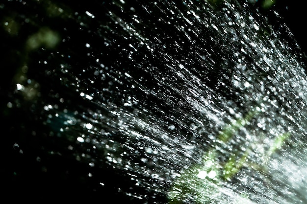 Photo close-up of water drops on water