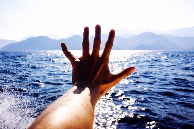 Close-up of water on sea against sky