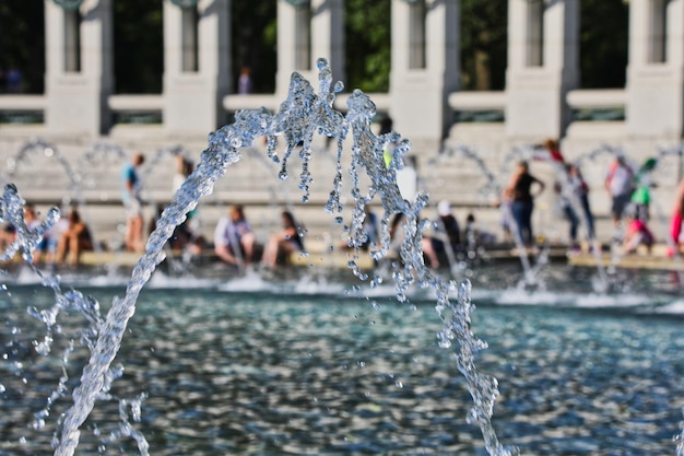 Photo close-up of water splashing in fountain