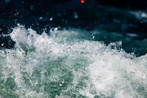 Close-up of water splashing in sea