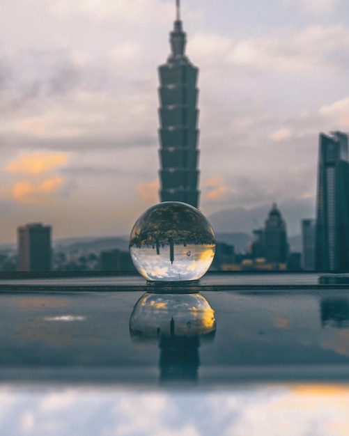 Photo close-up of water tower against cloudy sky