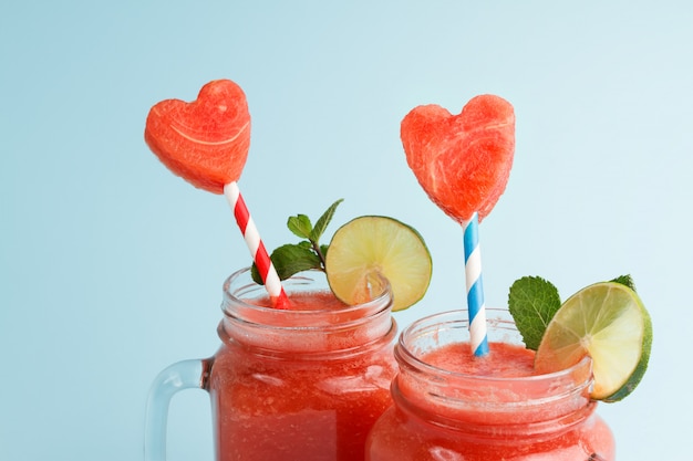 Close-up of watermelon shakes with heart-shaped slices