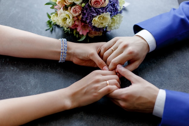 Close-up of wedding hands with rings